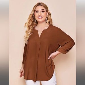 Notched Neck Curved Hem Top